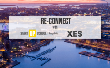 Reconnect with startup school and XES. Aerial picture of Helsinki on the background.